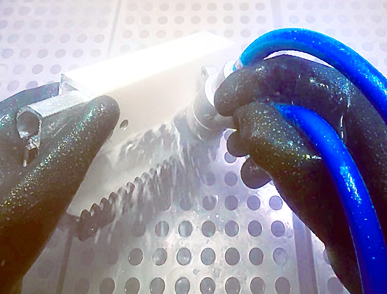 close up image of vapour honing Acorn / Brooks 180 stairlift track to remove contaminents
